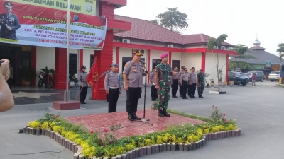 Kapolres Pelabuhan Belawan Pimpin Upacara Polri- TNI Pelepasan Tim Renang Dan Dayung