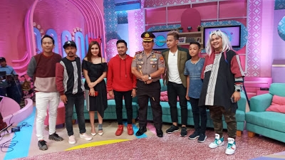 AKBP Ikhwan Lubis, SH.MH Dampingi Penyanyi Pevin di Acara Brownis