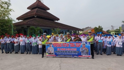 Sat Lantas Polres Pelabuhan Belawan Gelar Sosialisasi Operasi Patuh Toba 2024 di SMK Muhammadiyah 04 Belawan