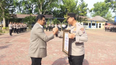 Penghargaan Komnas PA Kepada Kapolres Langkat, AKBP David Triyo Prasojo, Dinobatkan Sebagai Pelindung Anak Teladan